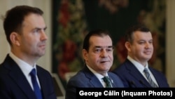 Liderii alianței Dreapta Unită, Cătălin Drulă (s), Ludovic Orban (c) și Eurgen Tomac (d).