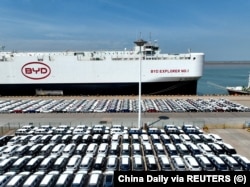 BYD electric vehicles await being loaded for export in the Chinese port of Lianyungang in Jiangsu Province. (file photo)