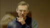 "Зло все еще торжествует". Рунет в годовщину смерти Алексея Навального
