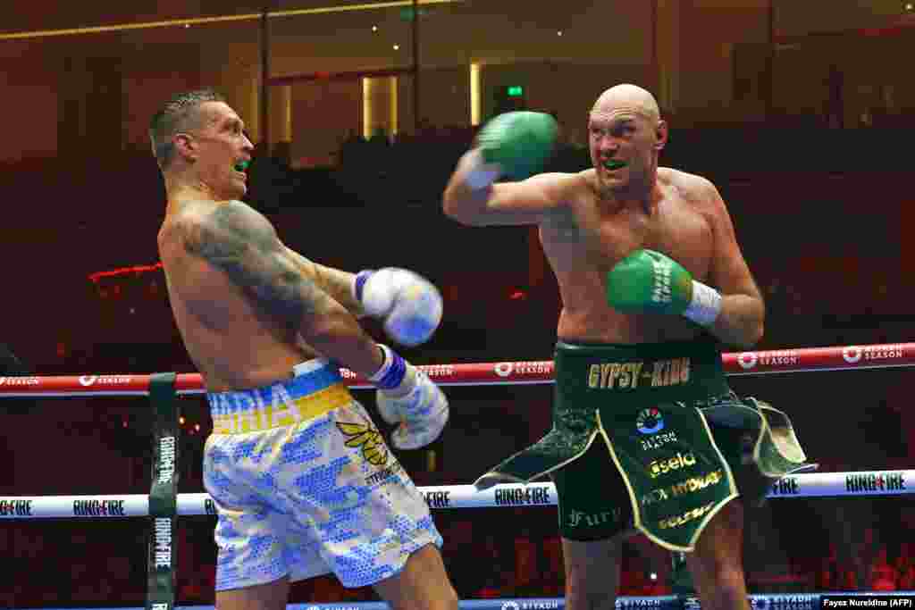 Usyk (left) dodges a hook from British heavyweight Tyson Fury in May 2024.The Ukrainian boxer captured the world’s imagination with a David vs. Goliath display against Tyson Fury, who was 18 kilos heavier than Usyk at weigh-in and has an 18 centimeter reach advantage. Usyk has beaten Fury twice, handing the Briton his only defeats. Usyk remains unbeaten as a professional.
