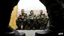 Russian conscripts are forbidden by law from serving in combat zones. But there are loopholes. 