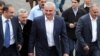 Armenia - Businessman Samvel Karapetian (center) arrives for the consecration of a new church in Abovian, May 14, 2013.