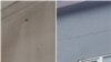 Armenia - Photographs released by the Defense Ministry show bullet holes on a building in Khnatsakh village, April 14, 2025.