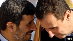 بشار اسد (راست) و محمود احمدی‌نژاد