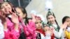 Бишкектеги Нооруз майрамындагы кыздар. Иллюстрациялык сүрөт.