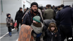 A file photo of migrants at a temporary shelter in Belarus
