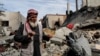 Un palestinian la locul unde a avut loc un atac aerian israelian, în orașul Rafah. 1 martie 2024.