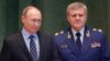 Орус президенти Владимир Путин менен башкы прокурорлук кызматтан кетип жаткан Юрий Чайка. 