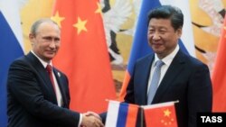 Володимир Путін та Сі Цзіньпін, вересень 2015 року