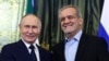 Президент России Владимир Путин и президент Ирана Масуд Пезешкиан перед началом переговоров в Кремле. Москва, 17 января 2025 года