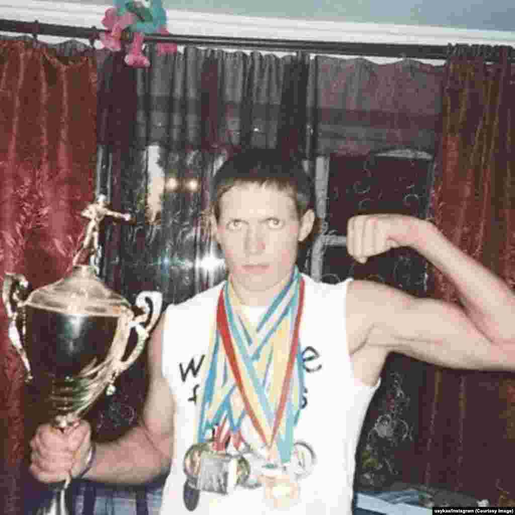Usyk with some of his early boxing medals.The sportsman says when he was a child he promised his mother he would one day buy a large house where the family could live together. “With these hands, I will do everything in my power to make sure you no longer have to work, my dear mother,” he told her.