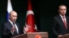 Туркойчоь - Туркойчоьнан президент ЭрдохIан Реджеп а (аьтт), Оьрсийчоьнан президент Путин Владимир а (аьрр) зорбанан конференцехь. Хонкара, ГIур.1. 2014