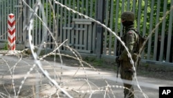 Польскі вайсковец на мяжы Польшчы і Беларусі. Архіўнае фота