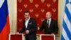 Оьрсийчоь -- Оьрсийчоьнан премьер-министр Путин Владимир (аьттоагIор), Грецин премьер-министр Ципрас Алексис, Кремлехь. Москох, 08Охан2015 шо.