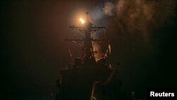 АКШ башында турган операциянын алкагында, аскердик кемеден Йемендеги хуситтердин жайларына каршы ракета учурулуп жатат. 12-январь, 2024-жыл.
