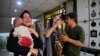 Iran -- Wounded people react following an Israel airstrike in central Tehran, Iran, 15 June 2025