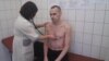 Фото засудженого в Росії українського режисера Олега Сенцова, яке оприлюднили російські тюремники, й котре, як випливало з повідомлення, було зроблене під час медичного обстеження 28 вересня 2018 року