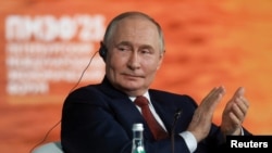 V.Putin